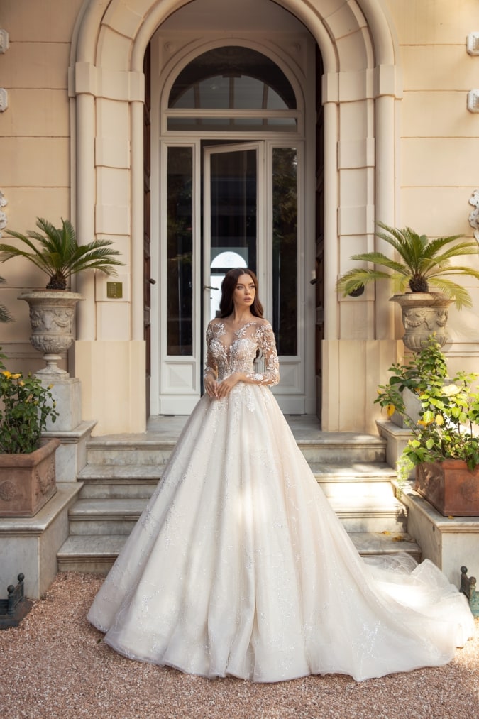 Ball gown wedding dress with long lace sleeves