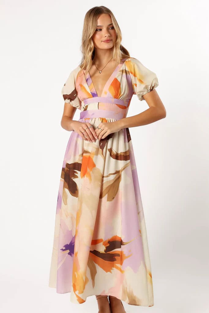 Model wearing a floral print dress