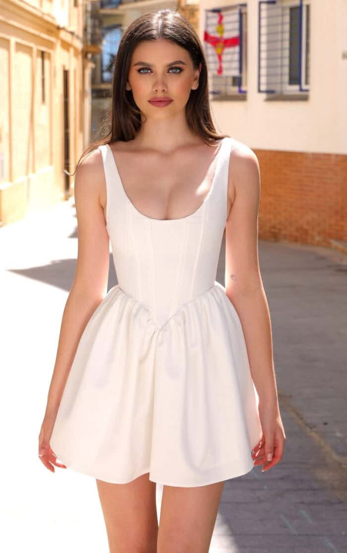 White mini corset dress on model